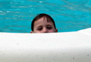 Click for detailed view of image P2220648_-_Josh_peering_out_of_satellite_pool