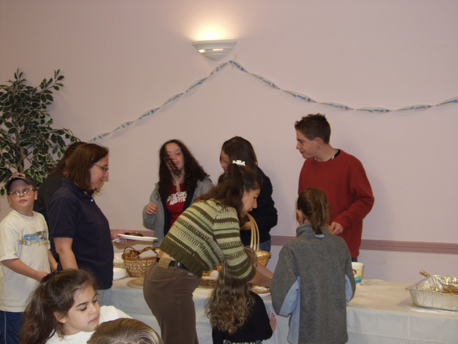 Click to return to grid view of the "Temple Shalom Emeth - 2001-02" gallery "Hanukah Party & Hanukiot"