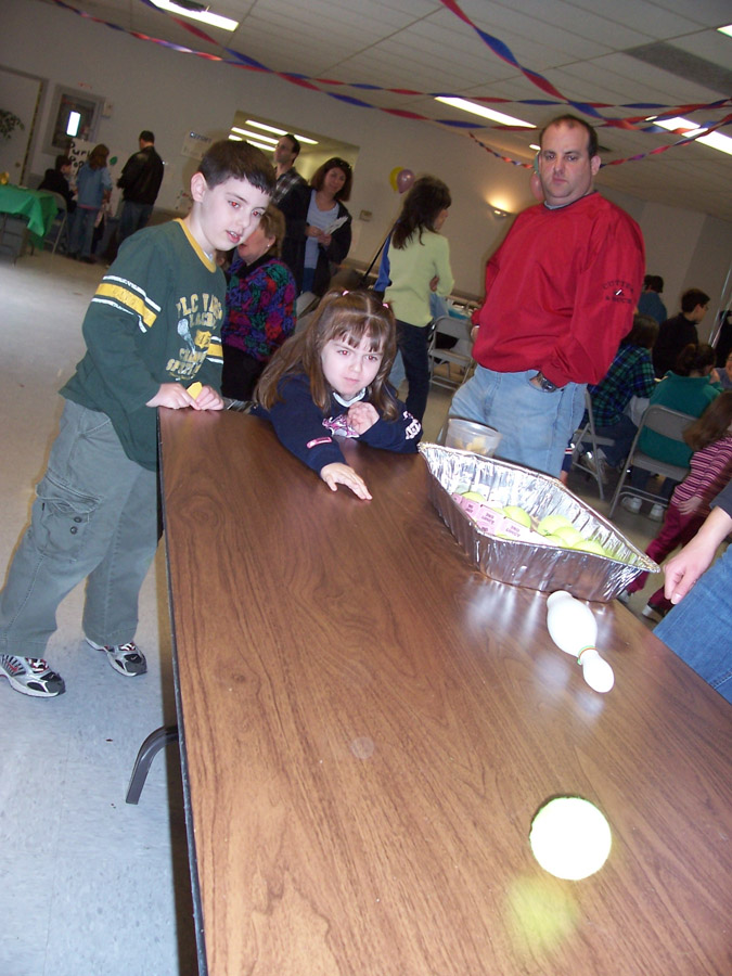 Click to return to grid view of the "Temple Shalom Emeth - 2005-06" gallery "Purim Carnival"