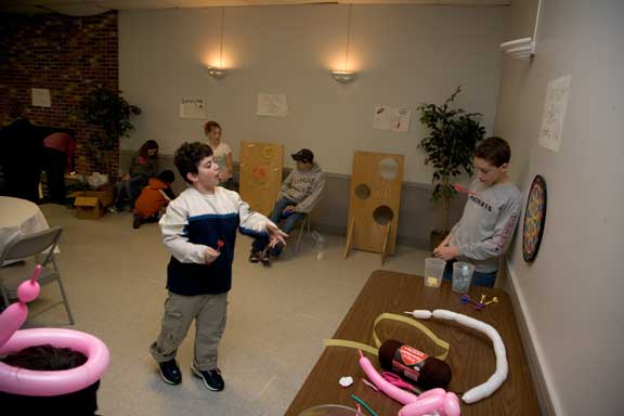 Click to return to grid view of the "Temple Shalom Emeth - 2006-07" gallery "Purim Carnival"